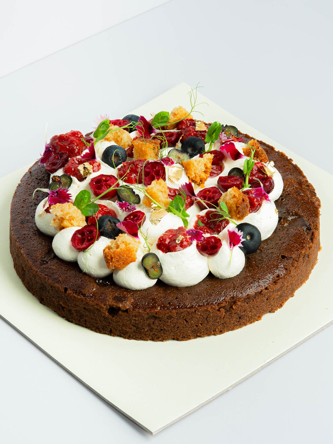 ate Fudgy Brownie Cake with Berries